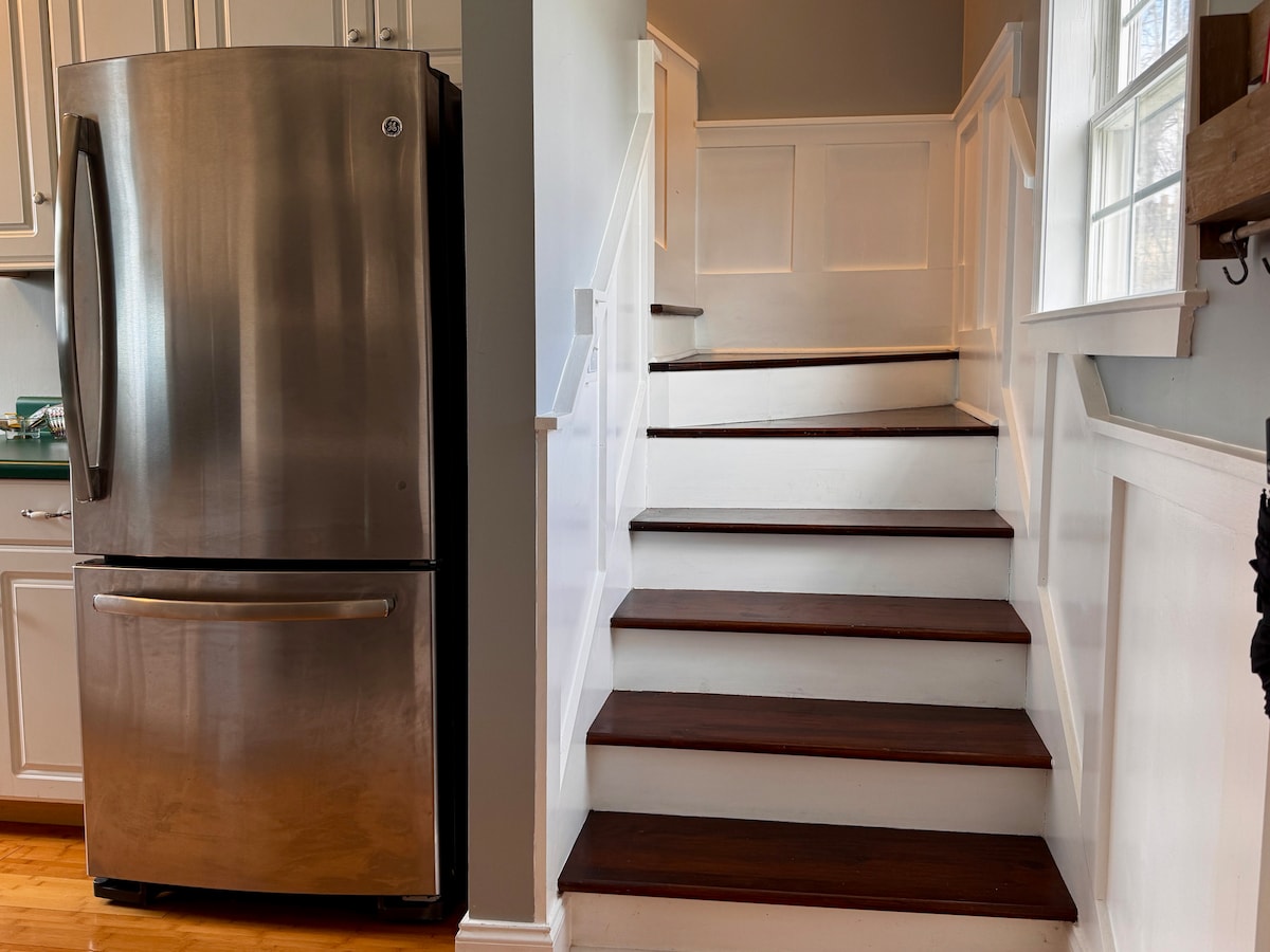 Kitchen with stairs up to the bedroom